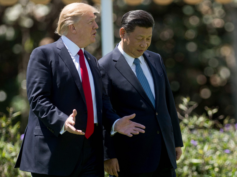 川普去年在一场募款餐会上自述，曾警告习近平犯台后果的录音档曝光。（法新社）