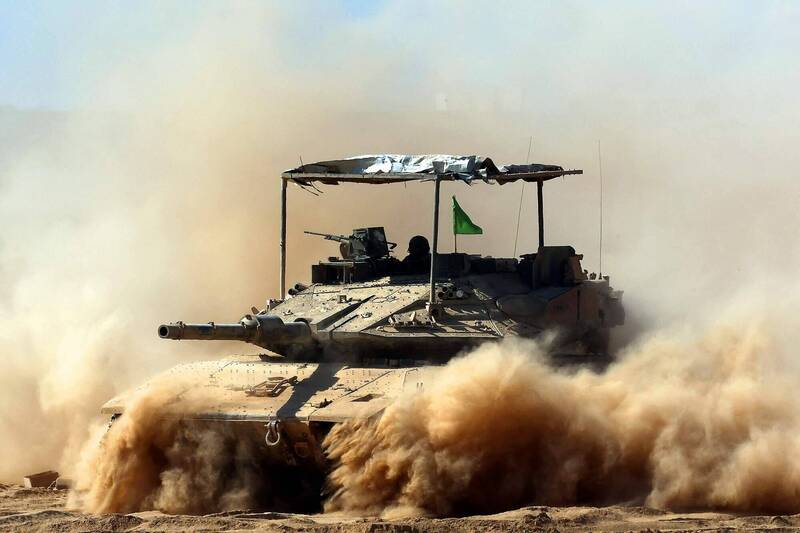 巴勒斯坦消息人士指控，以色列仍企圖在加薩走廊保留軍隊。圖為部署加薩的以軍部隊。（法新社）